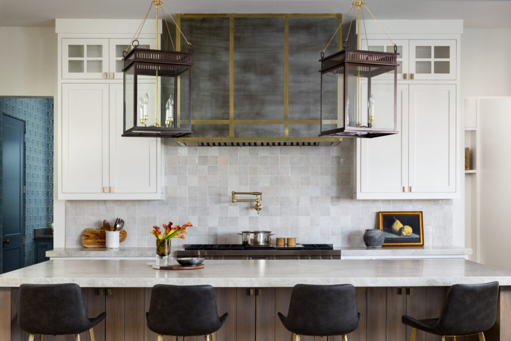 kitchen setting bright with warm tones and white cabinets