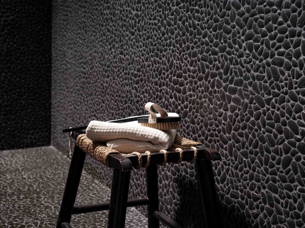 Boulder Negro Marquina 12X12 shower pan and wall sample